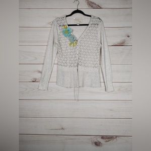 Nick and Nora size Large sweater Woman’s white crocheted with decorative flower.